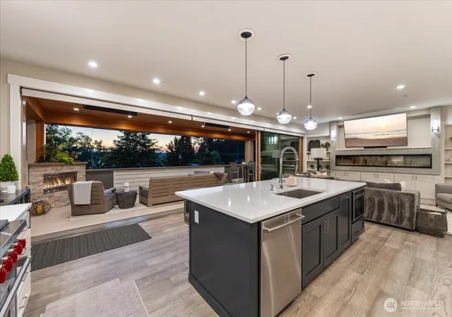 Photo 3 of Single family home for sale at 11822 Holmes Point Dr NE, Kirkland, WA 98034 | MLS# NWM2587687 | Listing updated on 2026-09-30