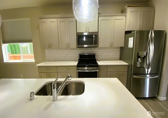Photo 3 of Single family home for sale at 410 Buell St Sw, Orting, WA 98360 | MLS# NWM2588479 | Listing updated on 2026-09-30