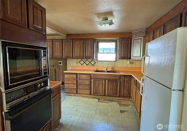 Photo 4 of Single family home for sale at 12346 1st Avenue NE, Seattle, WA 98125 | MLS# NWM2588859 | Listing updated on 2026-10-01