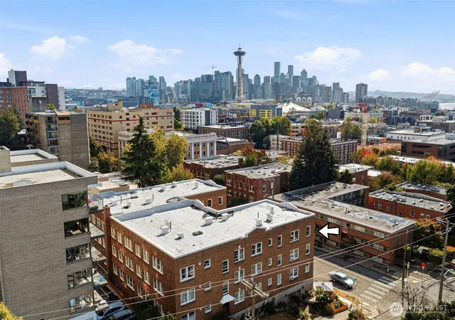 Photo 2 of Condo for sale at 220 W Olympic Pl #303, Seattle, WA 98119 | MLS# NWM2589235 | Listing updated on 2026-10-01