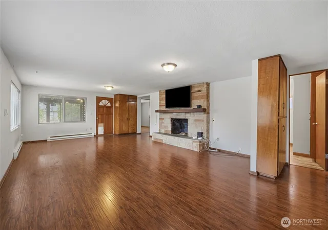 Photo 2 of Single family home for sale at 702 E 51st Street, Tacoma, WA 98404 | MLS# NWM2590335 | Listing updated on 2026-10-03