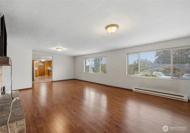 Photo 3 of Single family home for sale at 702 E 51st Street, Tacoma, WA 98404 | MLS# NWM2590335 | Listing updated on 2026-10-03