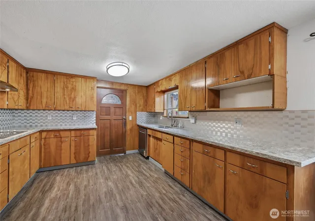 Photo 4 of Single family home for sale at 702 E 51st Street, Tacoma, WA 98404 | MLS# NWM2590335 | Listing updated on 2026-10-03