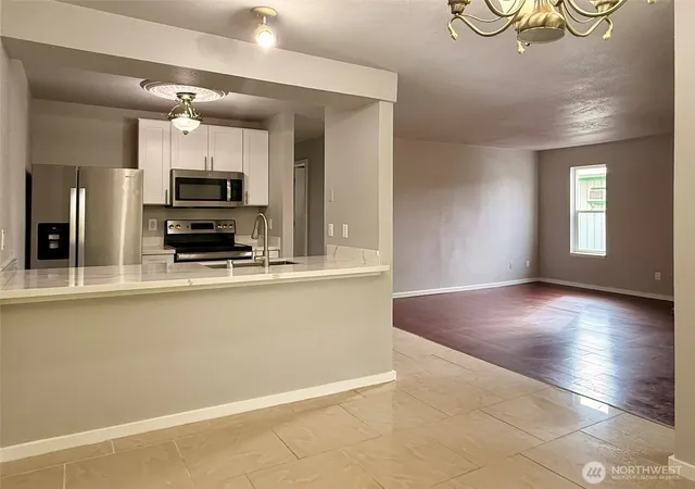 Photo 1 of Condo for sale at 3233 NE 12th Street #215, Renton, WA 98056 | MLS# NWM2591354 | Listing updated on 2026-10-13