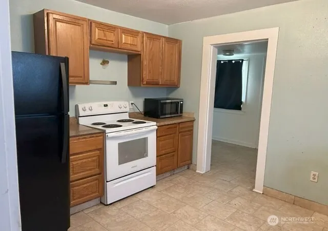 Photo 3 of Single family home for sale at 310 S Birch St, Omak, WA 98841 | MLS# NWM2591596 | Listing updated on 2026-10-07