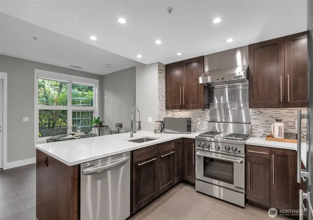 Photo 3 of Townhouse for sale at 10042 Main St #117, Bellevue, WA 98004 | MLS# NWM2591719 | Listing updated on 2026-10-08
