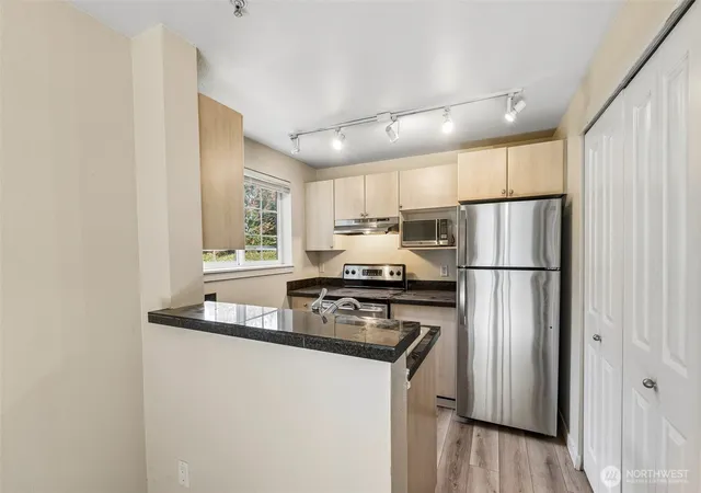 Photo 3 of Condo for sale at 10619 Se 261st Place #E106, Kent, WA 98030 | MLS# NWM2591720 | Listing updated on 2026-10-12