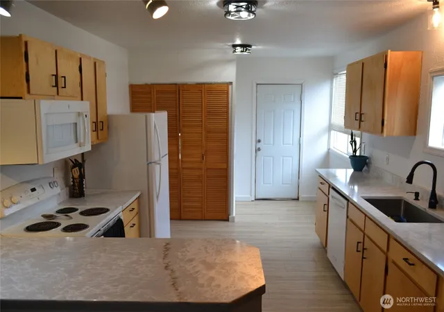 Photo 2 of Single family home for sale at 5614 S L St, Tacoma, WA 98408 | MLS# NWM2591852 | Listing updated on 2026-10-12