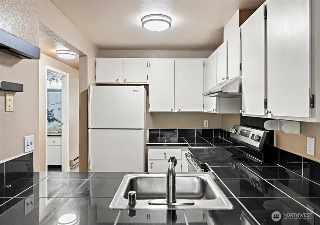 Photo 4 of Condo for sale at 17435 119 Lane SE #D31, Renton, WA 98058 | MLS# NWM2592630 | Listing updated on 2026-10-09