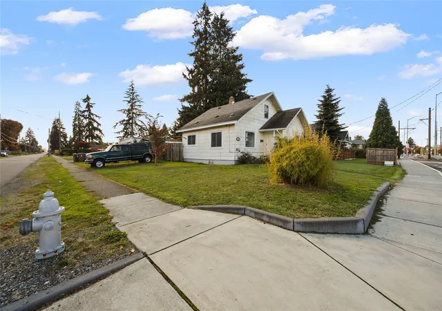 Photo 2 of Single family home for sale at 102 S 64th Street, Tacoma, WA 98408 | MLS# NWM2592709 | Listing updated on 2026-10-29