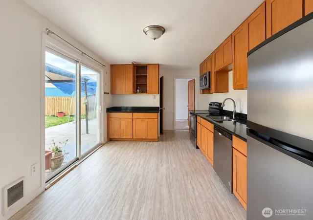 Photo 3 of Single family home for sale at 5813 E M St, Tacoma, WA 98404 | MLS# NWM2593005 | Listing updated on 2026-10-10