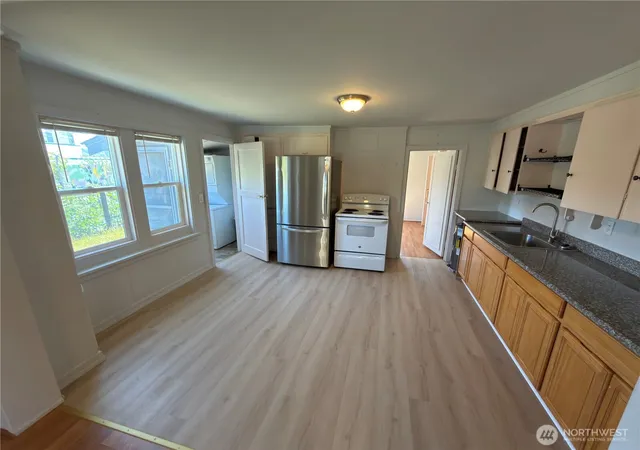 Photo 4 of Single family home for sale at 1409 NW 54th Street, Seattle, WA 98107 | MLS# NWM2593416 | Listing updated on 2026-10-12