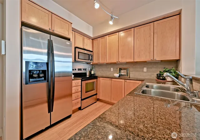 Photo 2 of Condo for sale at 1501 Tacoma Ave S #417, Tacoma, WA 98402 | MLS# NWM2593731 | Listing updated on 2026-10-20