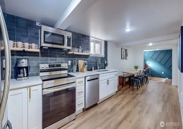 Photo 4 of Multi family home for sale at 723 S Sheridan Ave, Tacoma, WA 98405 | MLS# NWM2593878 | Listing updated on 2026-10-15