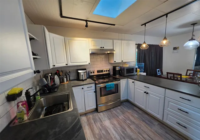 Photo 3 of Single family home for sale at 229 Pike St NE, Auburn, WA 98002 | MLS# NWM2595765 | Listing updated on 2026-10-18