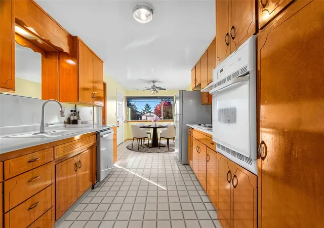Photo 2 of Single family home for sale at 7802 S Asotin St, Tacoma, WA 98408 | MLS# NWM2596474 | Listing updated on 2026-10-23
