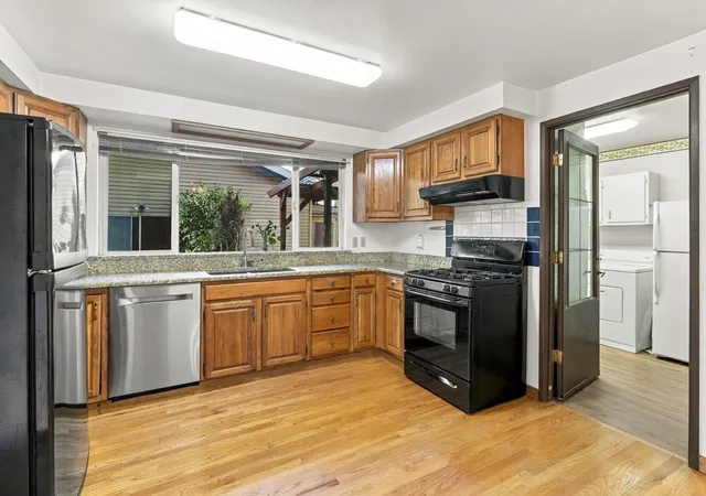 Photo 4 of Single family home for sale at 412 5th Street SW, Puyallup, WA 98371 | MLS# NWM2596785 | Listing updated on 2026-10-23