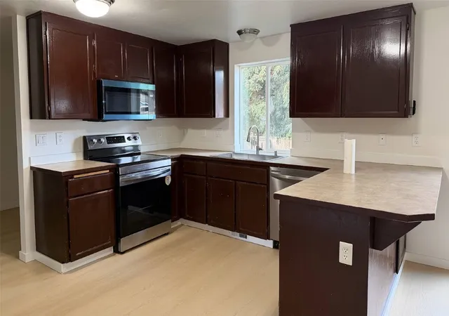 Photo 4 of Single family home for sale at 2009 E 64th Street, Tacoma, WA 98404 | MLS# NWM2598191 | Listing updated on 2026-10-28