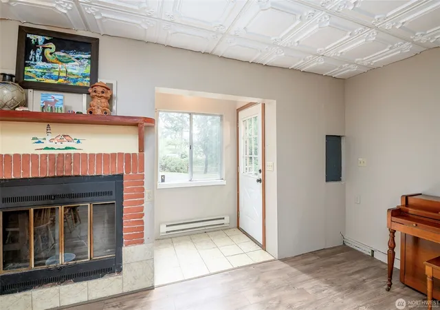Photo 3 of Single family home for sale at 1207 E Madrona Blvd Nw, Lakebay, WA 98349 | MLS# NWM2598378 | Listing updated on 2026-10-26
