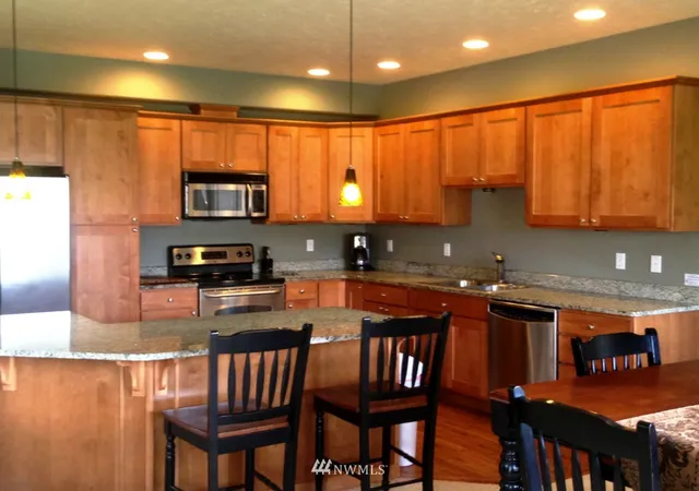Photo 2 of Single Family Residence at 9108 Red Hawk Ln NW #A72, Quincy, WA 98848 | MLS# NWM489065 | | Sold on 2014-04-18