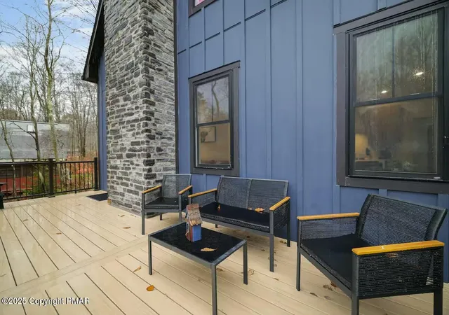 Photo 2 of Single family home for sale at 115 Bushkill Dr, Pocono Lake, PA 18347 | MLS# PM-121645 | Listing updated on 2025-12-01