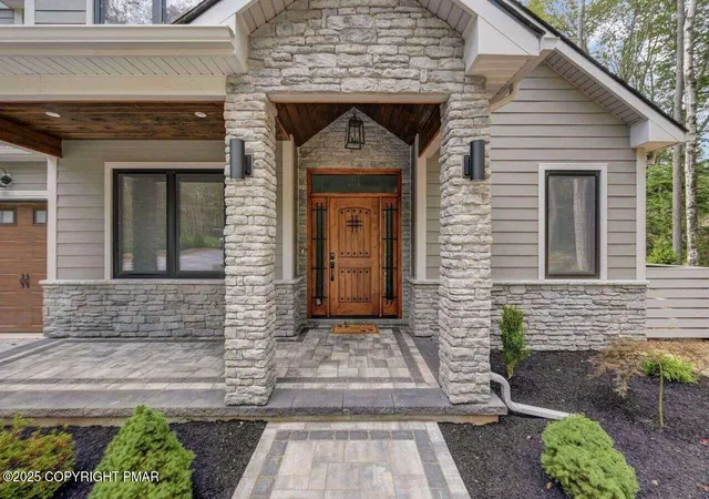 Photo 3 of Single family home for sale at 2210 White Oak Trl, Pocono Pines, PA 18350 | MLS# PM-131479 | Listing updated on 2025-10-12