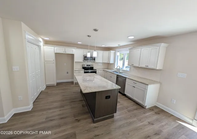 Photo 3 of Single family home for sale at 411 Pierce Ln, East Stroudsburg, PA 18301 | MLS# PM-132394 | Listing updated on 2026-09-01
