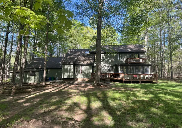 Photo 2 of Single family home for sale at 122 Sawmill Rd, Pocono Lake, PA 18347 | MLS# PM-133137 | Listing updated on 2025-07-27
