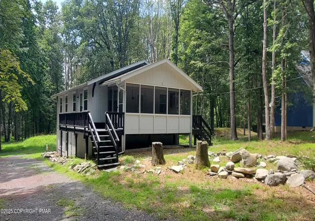 Photo 1 of Single family home for sale at 4932 Pine Ridge Dr W, Bushkill, PA 18324 | MLS# PM-133979 | Listing updated on 2025-11-24