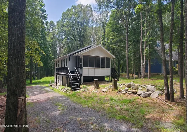 Photo 2 of Single family home for sale at 4932 Pine Ridge Dr W, Bushkill, PA 18324 | MLS# PM-133979 | Listing updated on 2025-11-24
