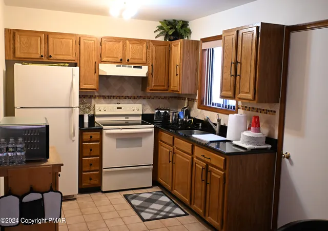 Photo 2 of Single family home for sale at 101 Withywindle Way, Tamiment, PA 18371 | MLS# PM-133840 | Listing updated on 2025-11-05