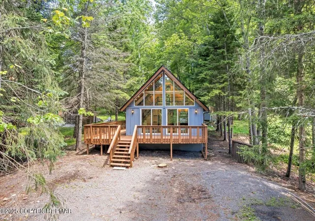 Photo 2 of Single family home for sale at 2321 Locust Ridge Rd, Pocono Lake, PA 18347 | MLS# PM-135421 | Listing updated on 2025-09-08