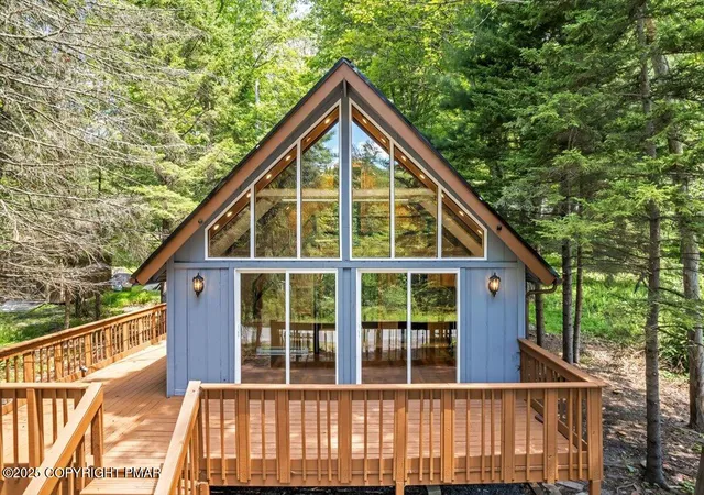 Photo 2 of Single family home for sale at 2321 Locust Ridge Rd, Pocono Lake, PA 18347 | MLS# PM-135421 | Listing updated on 2025-09-08