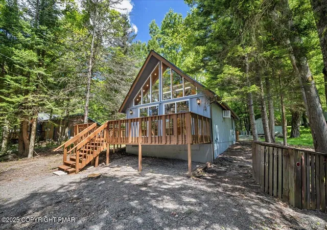 Photo 3 of Single family home for sale at 2321 Locust Ridge Rd, Pocono Lake, PA 18347 | MLS# PM-135421 | Listing updated on 2025-09-08