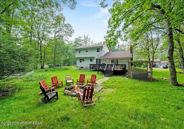 Photo 2 of Single family home for sale at 2102 Woodland Ct, Pocono Summit, PA 18346 | MLS# PM-134642 | Listing updated on 2025-10-30