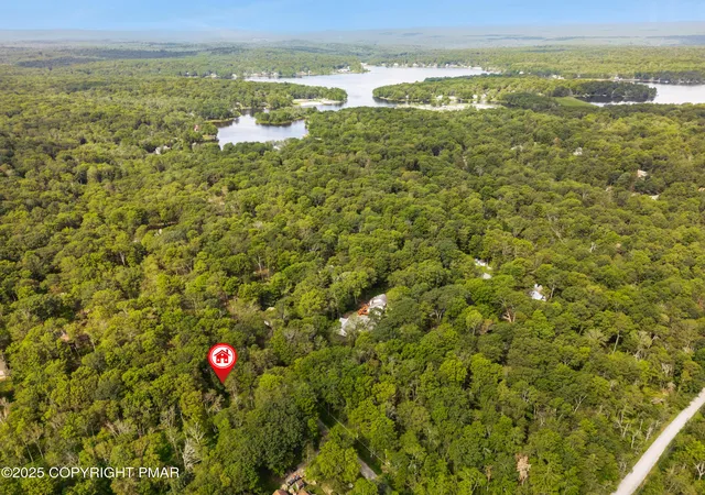 Photo 2 of Land for sale at 804 Evergreen Dr, Pocono Lake, PA 18347 | MLS# PM-134917 | Listing updated on 2025-11-26