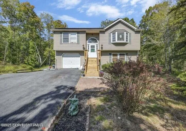 Photo 1 of Single family home for sale at 104 Yvette Ct, Dingmans Ferry, PA 18328 | MLS# PM-135124 | Listing updated on 2025-09-30