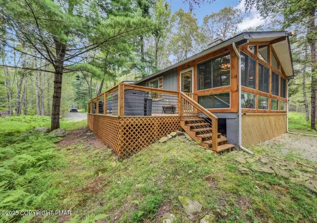 Photo 3 of Single family home for sale at 2300 Hillcrest Dr, Pocono Pines, PA 18350 | MLS# PM-135334 | Listing updated on 2025-10-09
