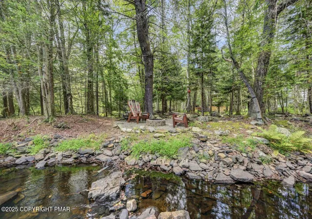 Photo 4 of Single family home for sale at 2300 Hillcrest Dr, Pocono Pines, PA 18350 | MLS# PM-135334 | Listing updated on 2025-10-09