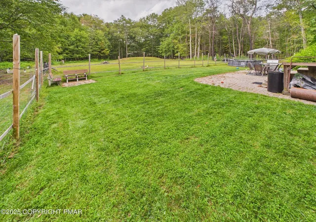 Photo 2 of Single family home for sale at 218 Spruce Run Dr, Dingmans Ferry, PA 18328 | MLS# PM-135846 | Listing updated on 2025-12-17