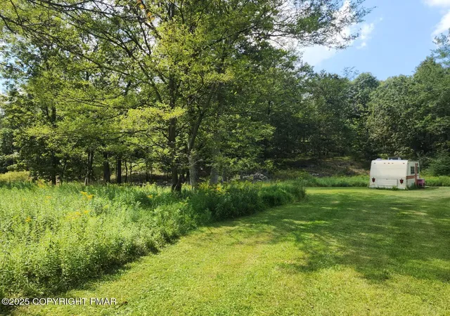 Photo 3 of Land for sale at 1153 Sylvan Ln, Tannersville, PA 18372 | MLS# PM-136041 | Listing updated on 2025-10-23