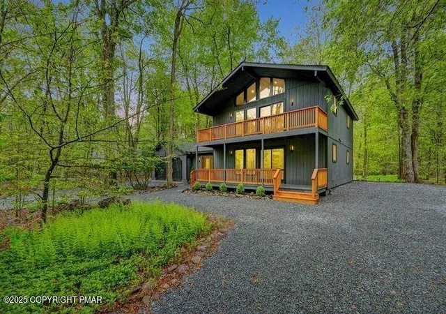 Photo 3 of Single Family Residence at 3200 Paul Bunyan Trl, Pocono Pines, PA 18350 | MLS# PM-136237 | | Sold on 2026-02-27