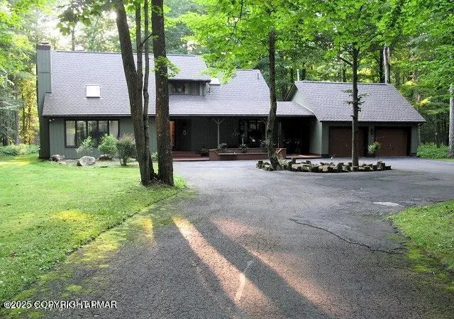 Photo 1 of Single Family Residence at 122 Sawmill Rd, Pocono Lake, PA 18347 | MLS# PM-136314 | | Sold on 2025-11-19