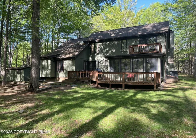 Photo 2 of Single Family Residence at 122 Sawmill Rd, Pocono Lake, PA 18347 | MLS# PM-136314 | | Sold on 2025-11-19