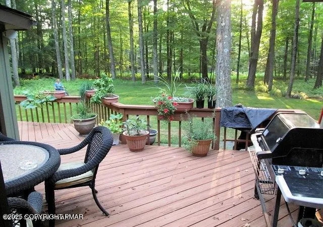 Photo 3 of Single Family Residence at 122 Sawmill Rd, Pocono Lake, PA 18347 | MLS# PM-136314 | | Sold on 2025-11-19