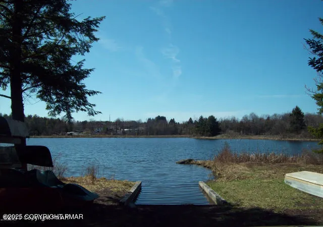 Photo 5 of Single Family Residence at 122 Sawmill Rd, Pocono Lake, PA 18347 | MLS# PM-136314 | | Sold on 2025-11-19