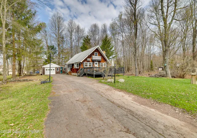 Photo 2 of Single family home for sale at 2158 Tuscarora Dr, Pocono Lake, PA 18347 | MLS# PM-136555 | Listing updated on 2026-04-22