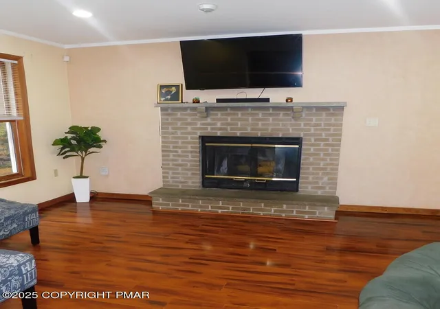 Photo 3 of Single family home for sale at 212 Spicebush Dr, East Stroudsburg, PA 18301 | MLS# PM-136594 | Listing updated on 2025-11-20
