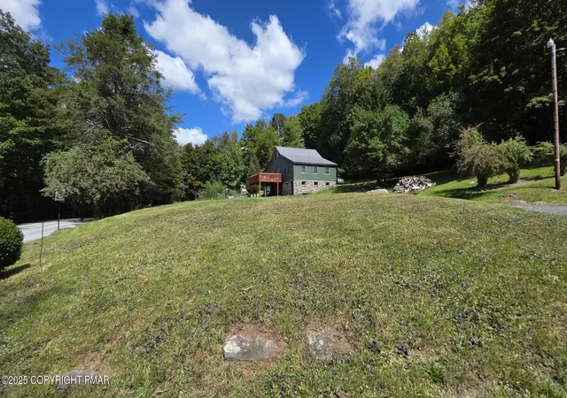 Photo 5 of Multi family home for sale at 394 Rt 447, Newfoundland, PA 18445 | MLS# PM-137307 | Listing updated on 2025-11-17