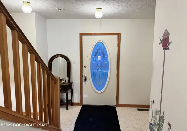 Photo 2 of Single family home for sale at 1145 Chickadee Dr, Pocono Summit, PA 18346 | MLS# PM-137150 | Listing updated on 2026-06-07